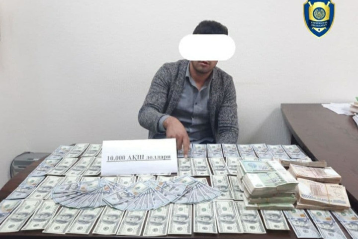 В Ташкентской области задержали валютчиков с крупной суммой